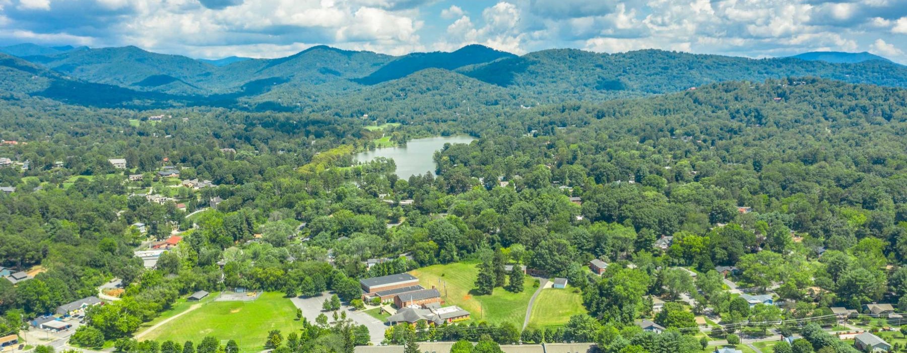 aerial shot of Ridge View Apartments and mountain range